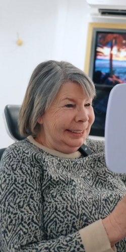 Implant patient reacting to the final result