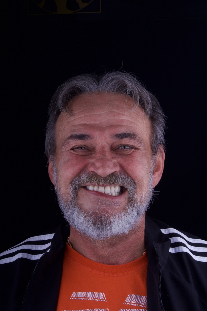 Denture patient smiling after treatment
